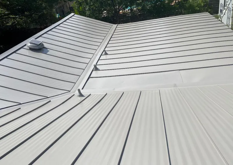 Solar attic fan installed on a metal roof for Roof Ventilation in La Mesa